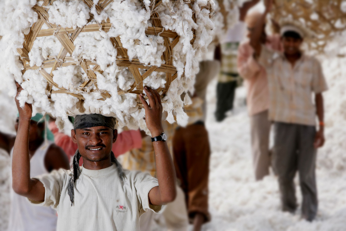 Piccalilly Way - Cotton worker carrying cotton on their head
